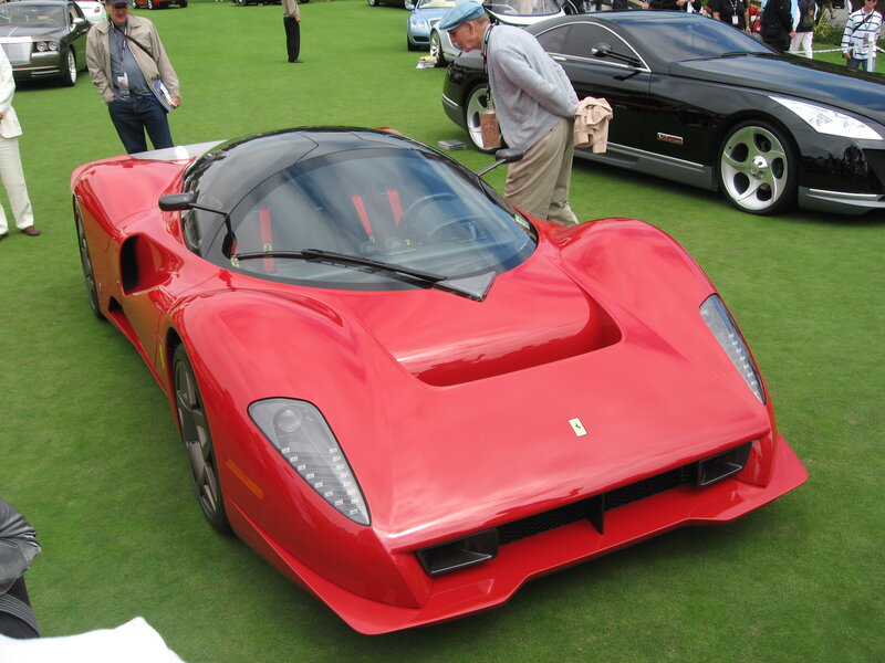 Red Ferrari race car on display
