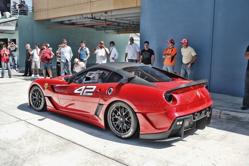 Red Ferrari race car on display