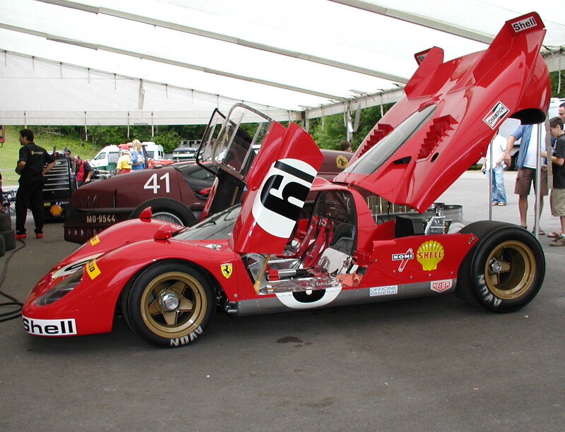 Red Ferrari race car on display
