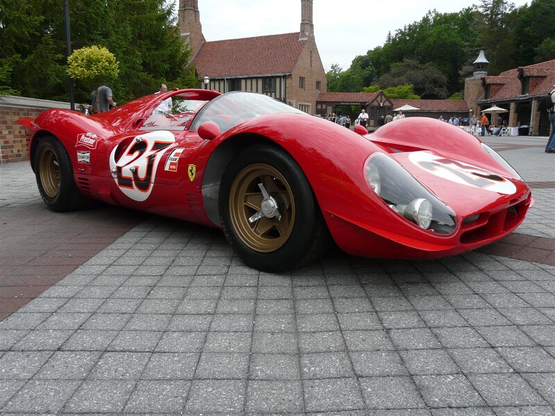 Red Ferrari race car on display