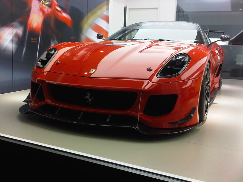 Red Ferrari race car on display