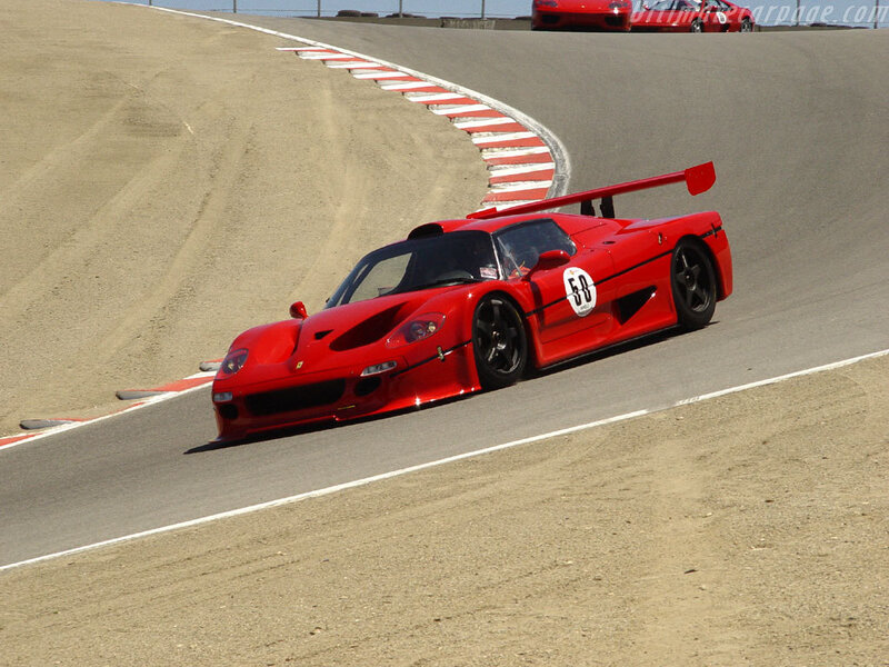 Red Ferrari race car on track