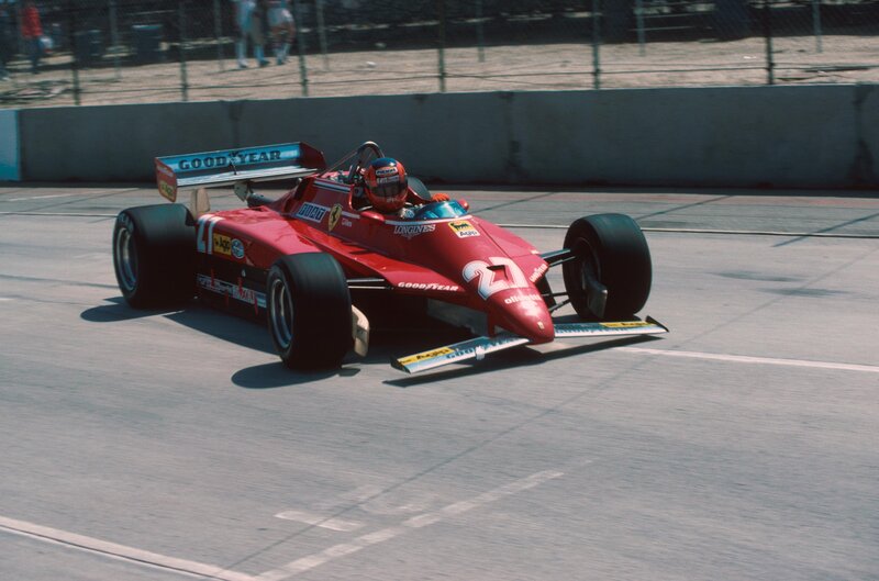 Red Ferrari race car on track