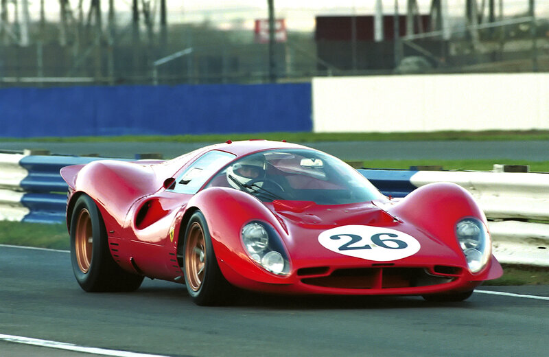 Red Ferrari race car on track