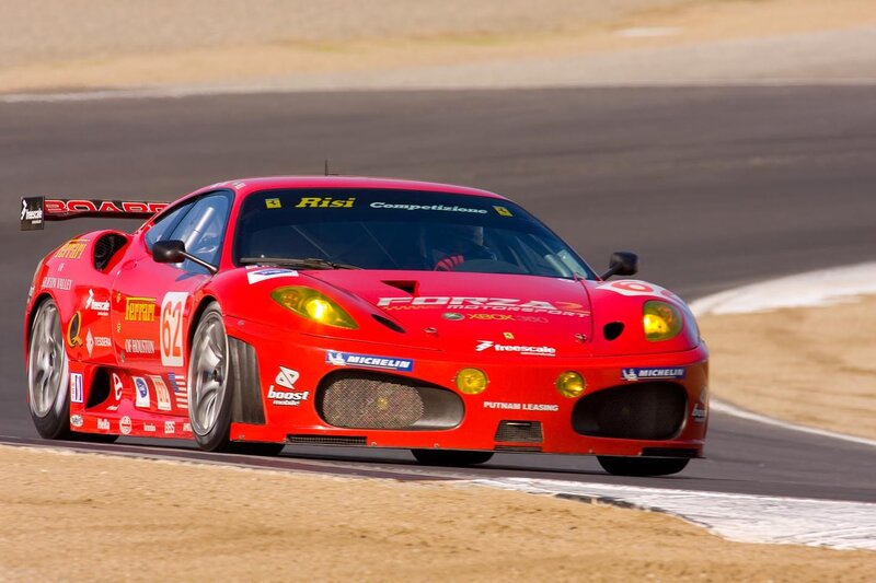 Red Ferrari race car on track