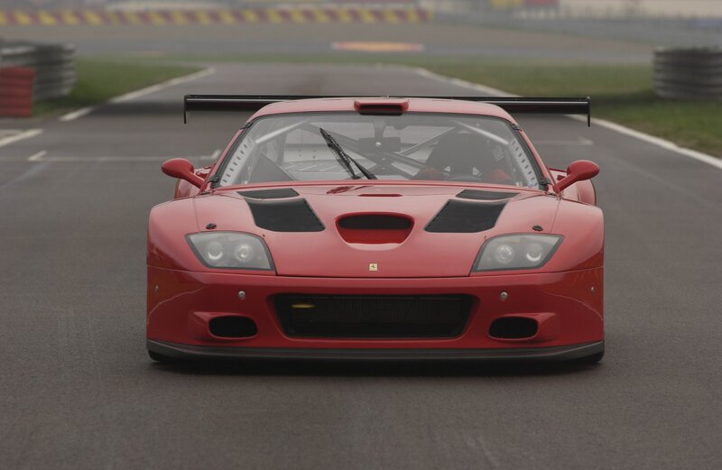 Red Ferrari race car on track