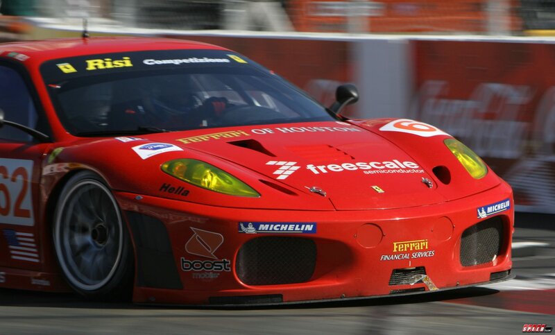 Red Ferrari race car on track