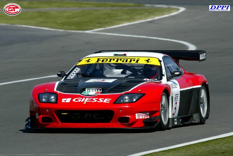 red ferrari race car on track