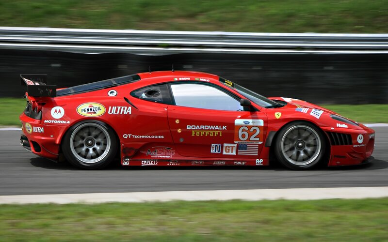 Red Ferrari race car on track
