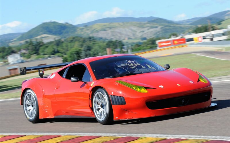 Red Ferrari race car on track
