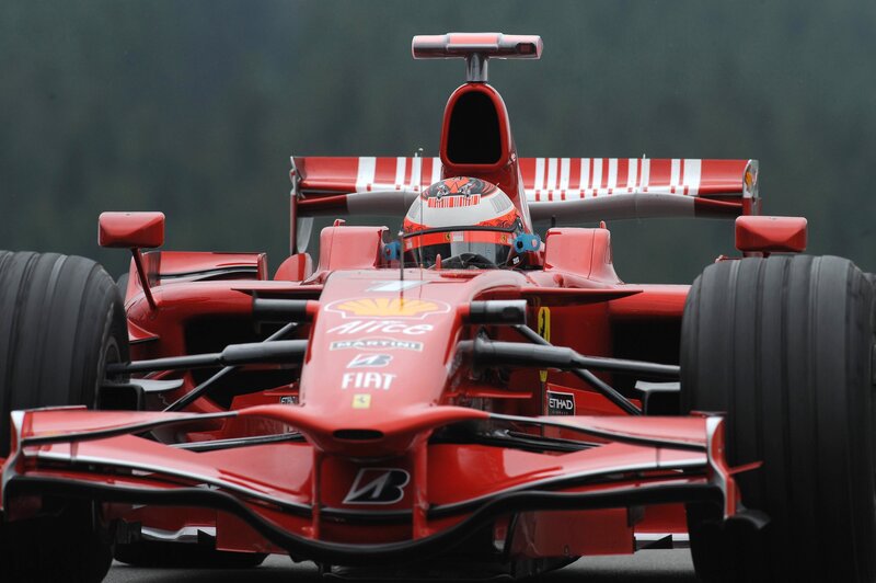 Red Ferrari race car on track