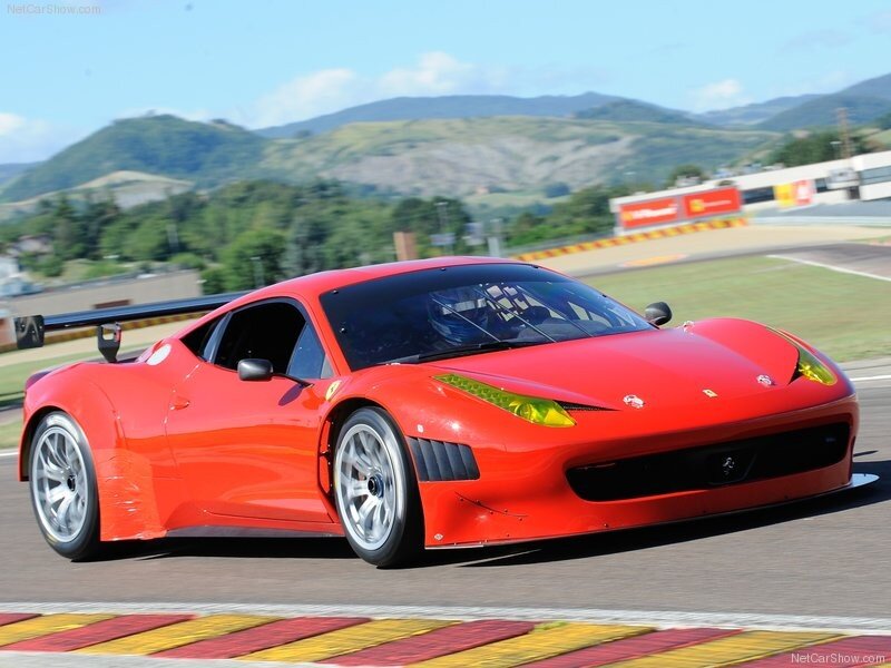 Red Ferrari race car on track