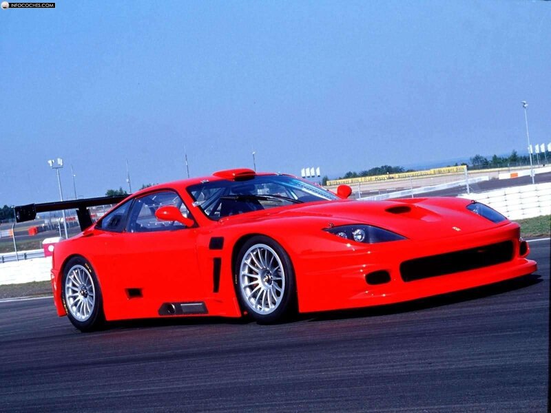 Red Ferrari race car on track
