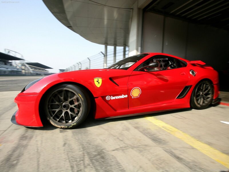 Red Ferrari race car on track