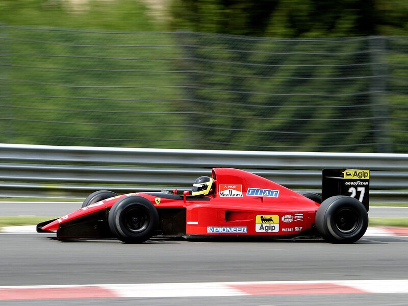Red Ferrari race car on track