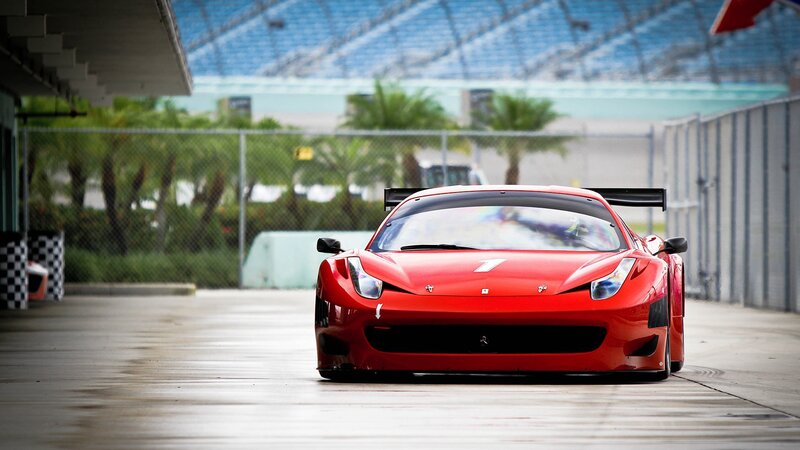 Red Ferrari race car on track