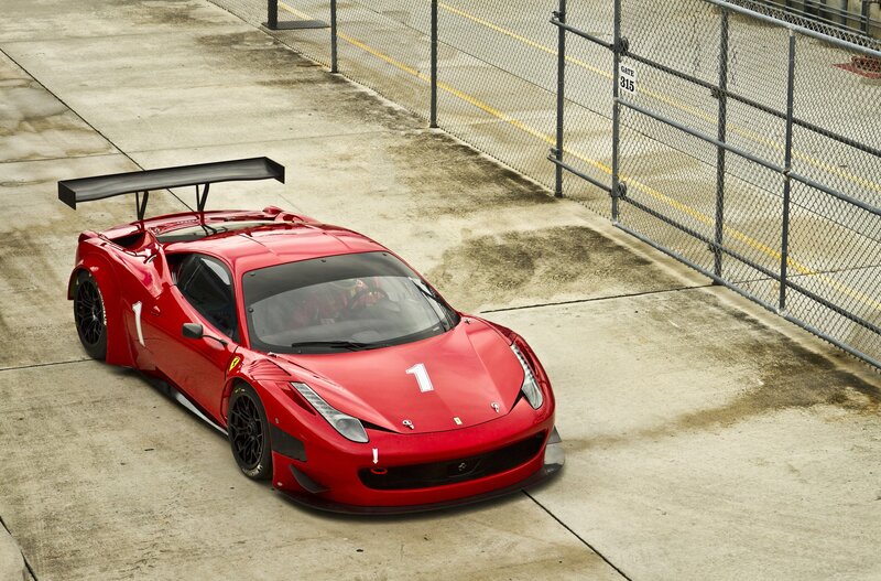 Red Ferrari race car on track
