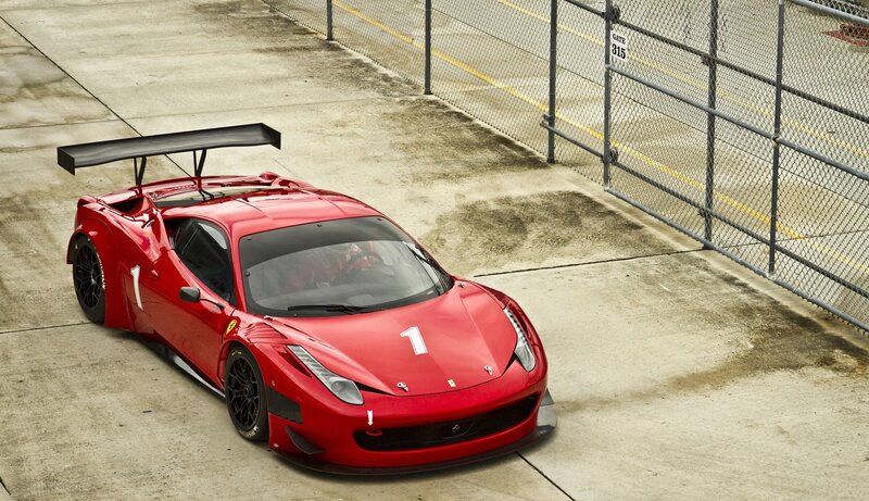 Red Ferrari race car on track