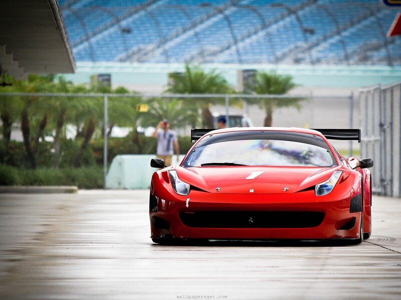 Red Ferrari race car on track