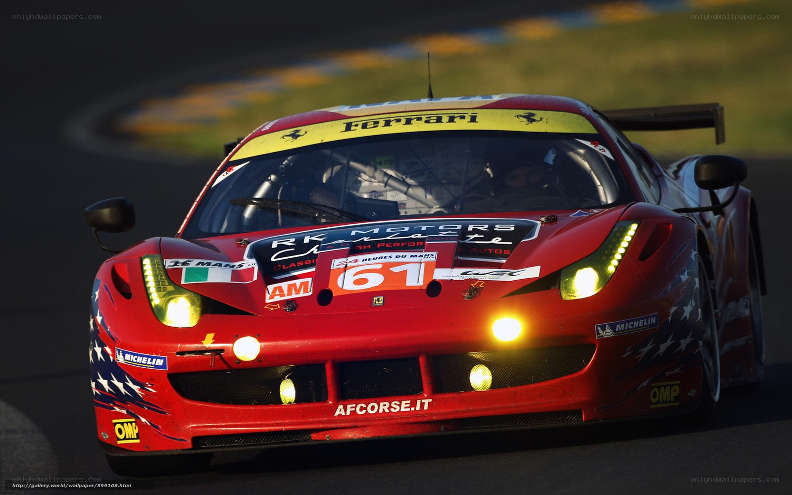 Red Ferrari race car on track