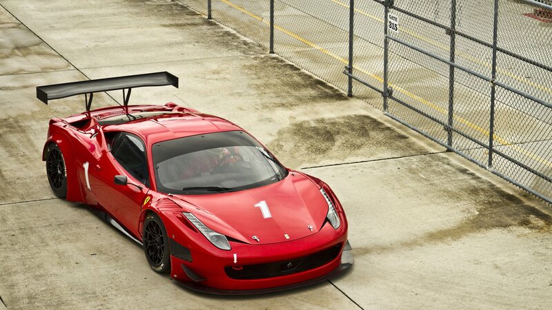 Red Ferrari race car on track