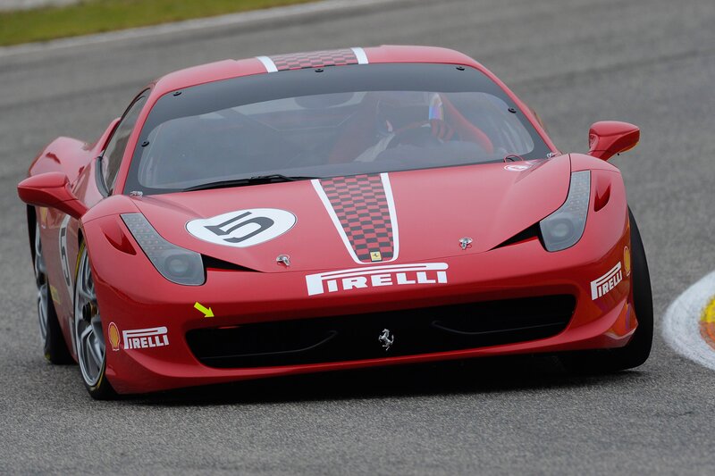 red ferrari race car on track