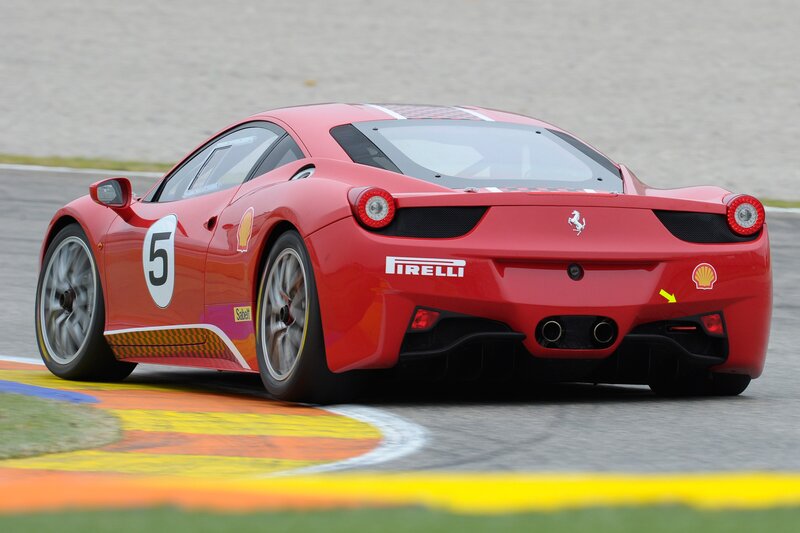 red ferrari race car on track