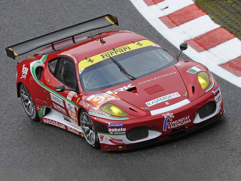 Red Ferrari race car on track