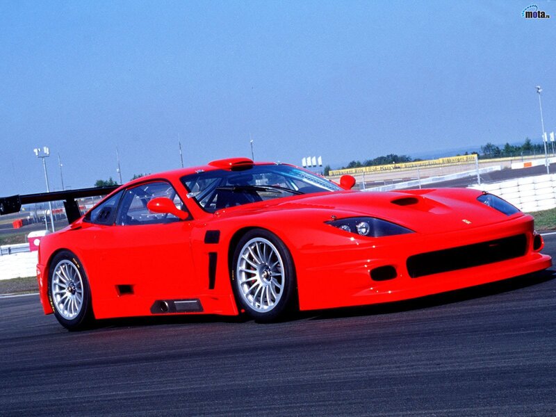 Red Ferrari race car on track
