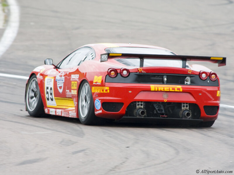 red ferrari race car on track