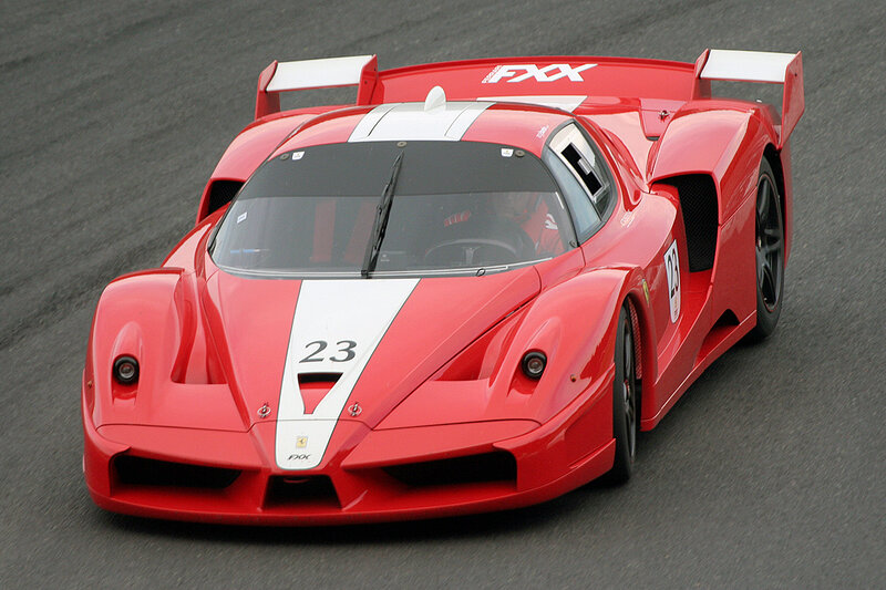Red Ferrari race car on track