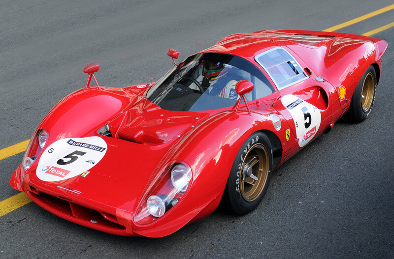 Red Ferrari race car on track
