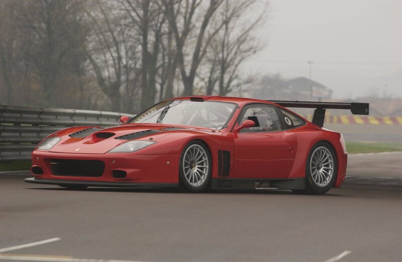 Red Ferrari race car on track