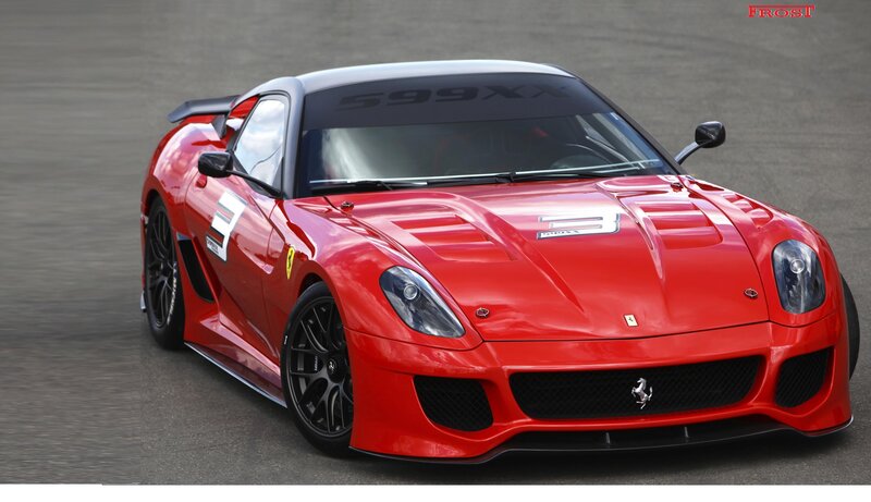 Red Ferrari race car on track
