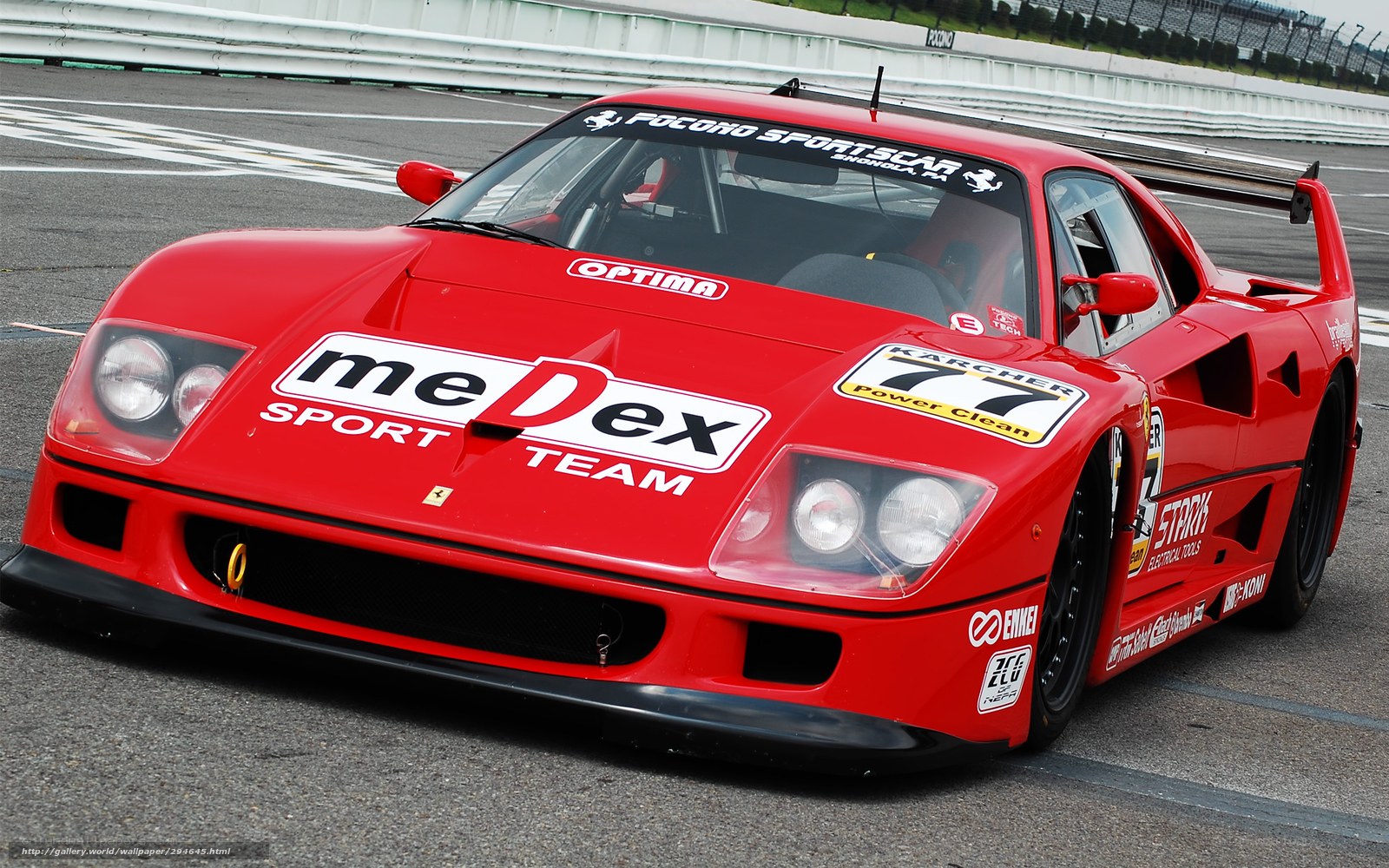 Red Ferrari race car on track