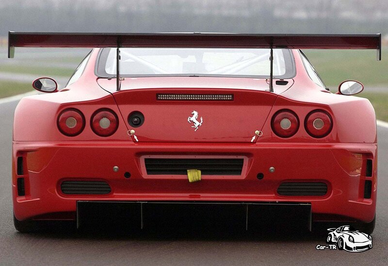 Red Ferrari race car rear view
