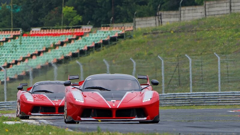 Red Ferrari Race Cars — Dynamic, Afternoon, Photograph