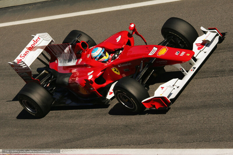Red Ferrari racing car on track