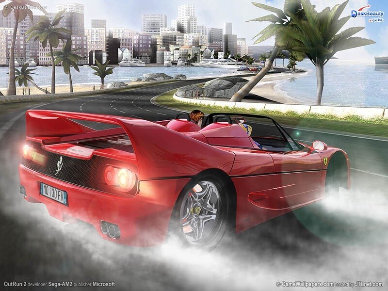 Red Ferrari racing on coastal road