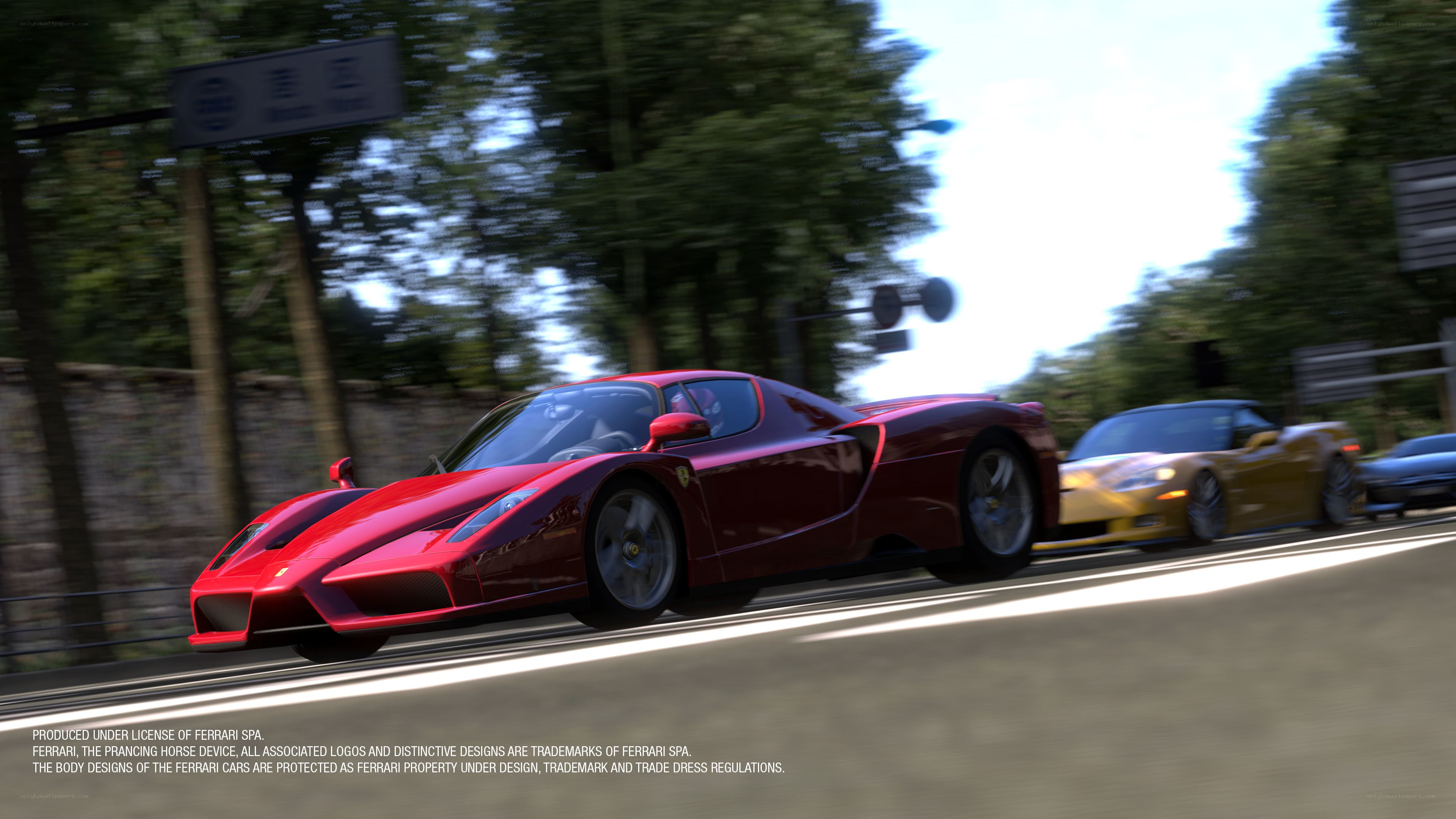 Red Ferrari racing on road