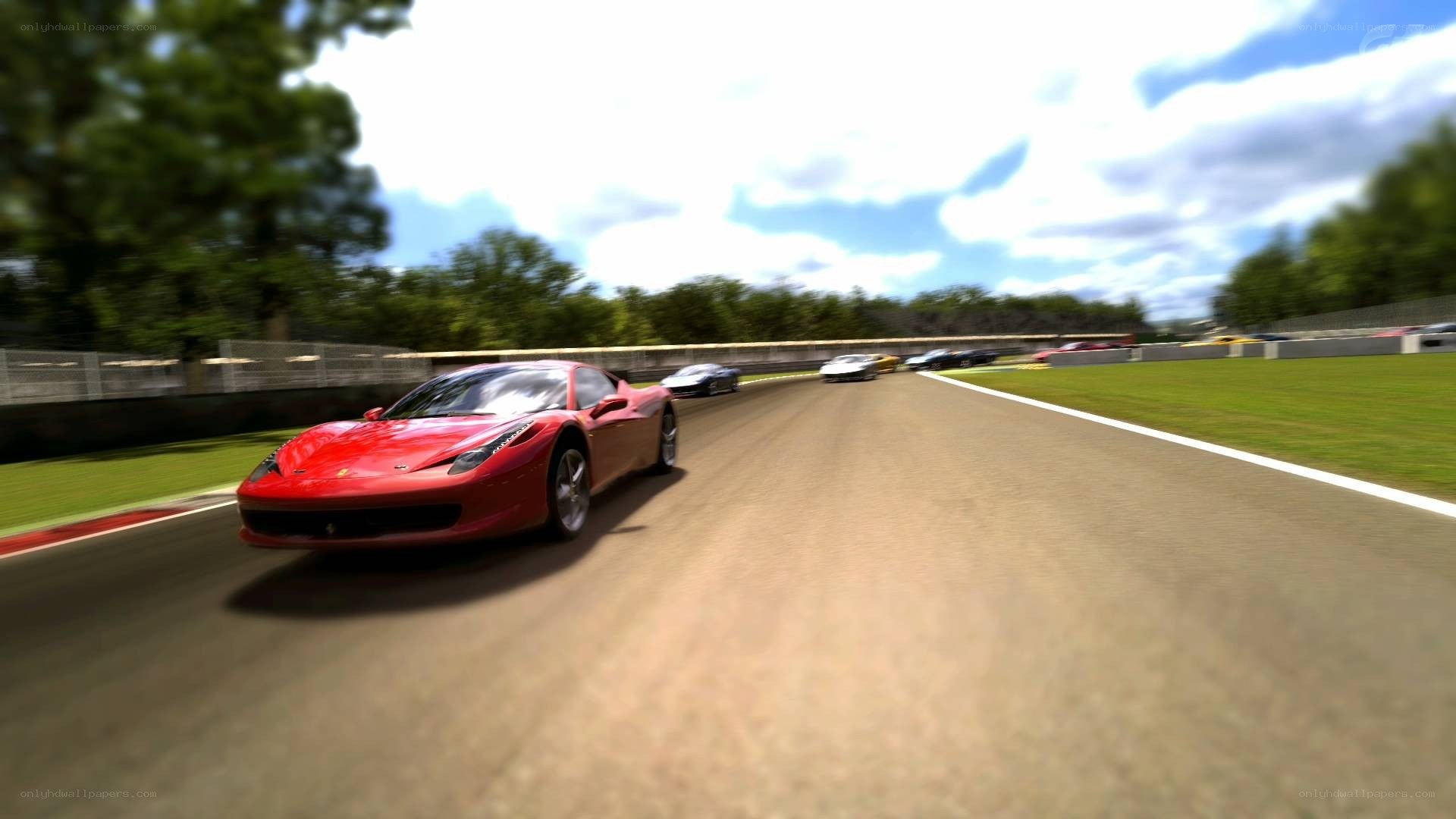 Red Ferrari racing on track