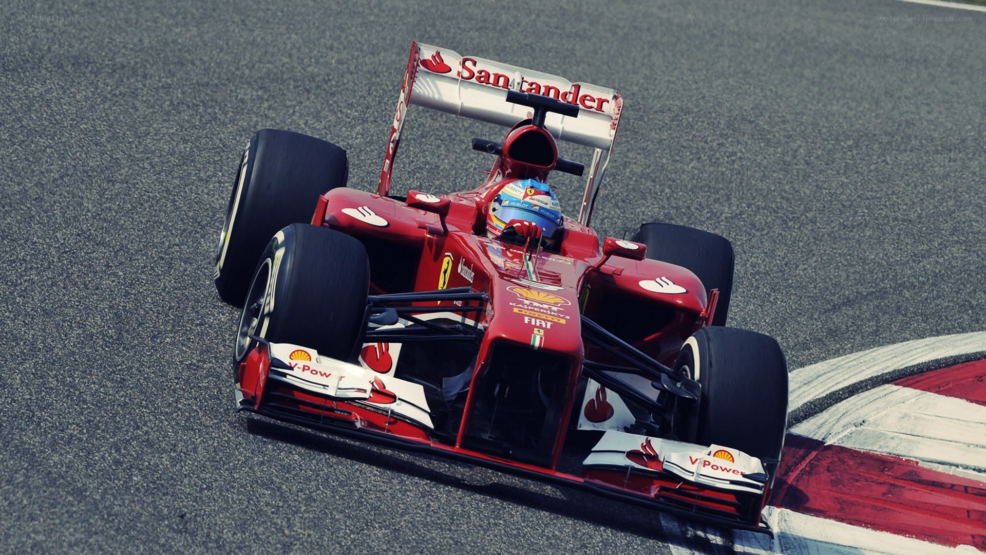 Red Ferrari racing on track