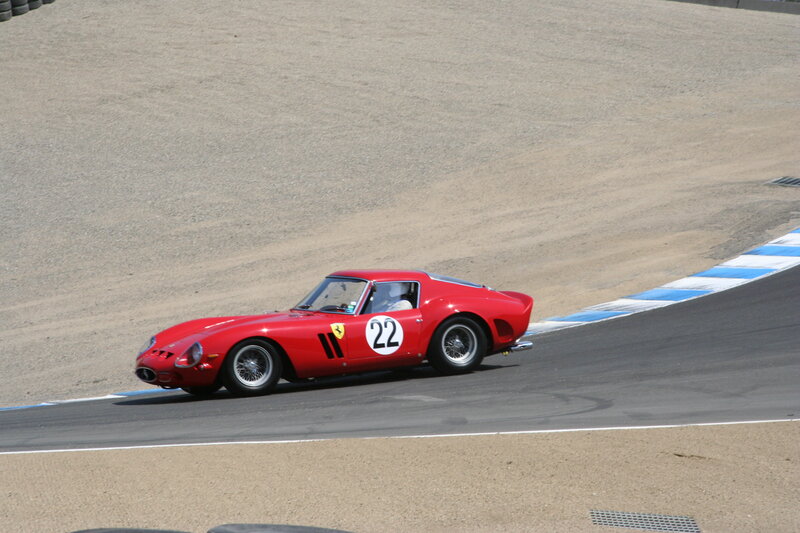 Red Ferrari racing on track