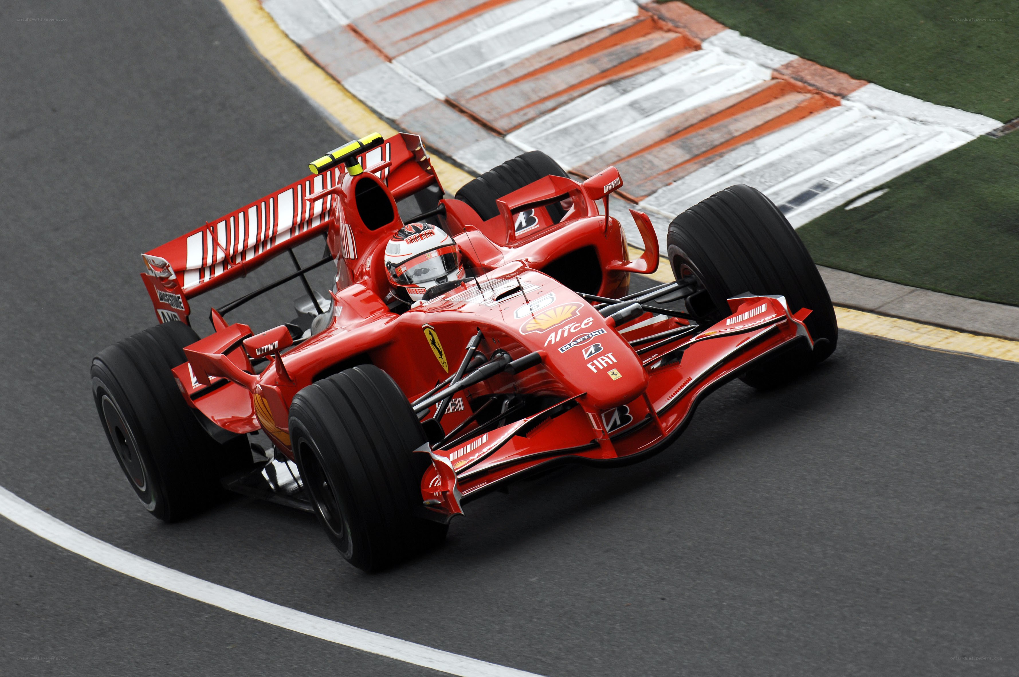 Red Ferrari racing on track