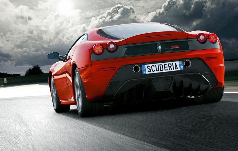 Red Ferrari Scuderia on track