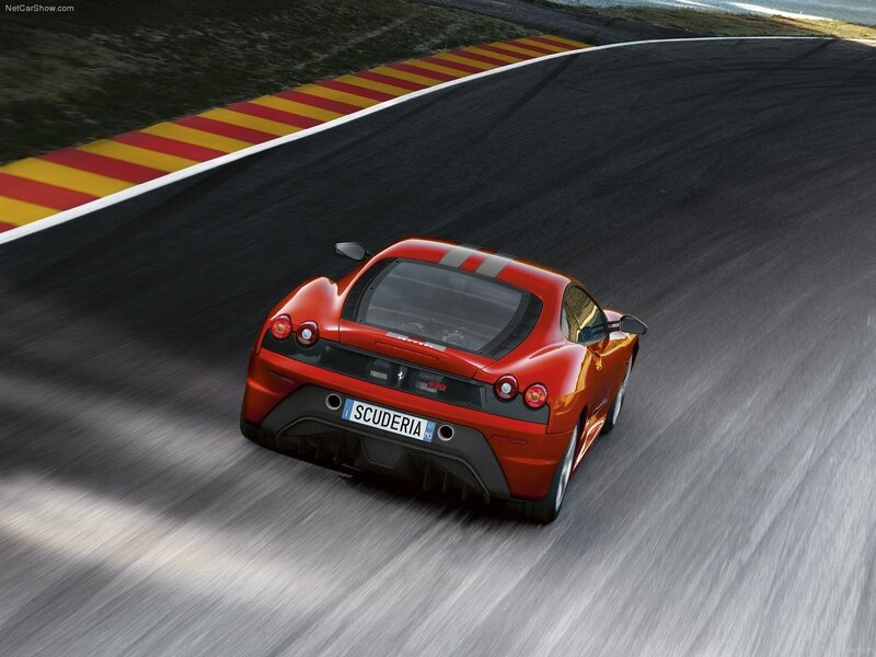 Red Ferrari Scuderia on track