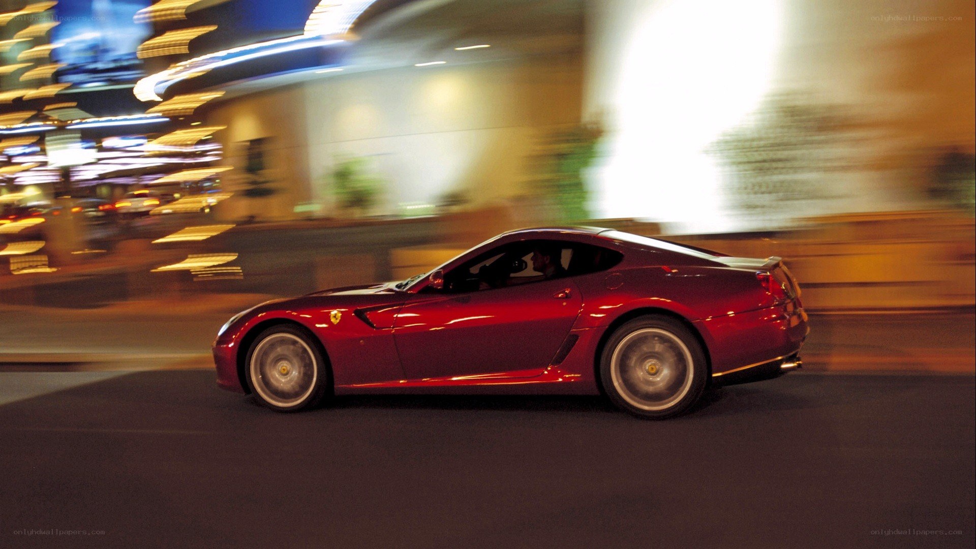 Red Ferrari speeding at night