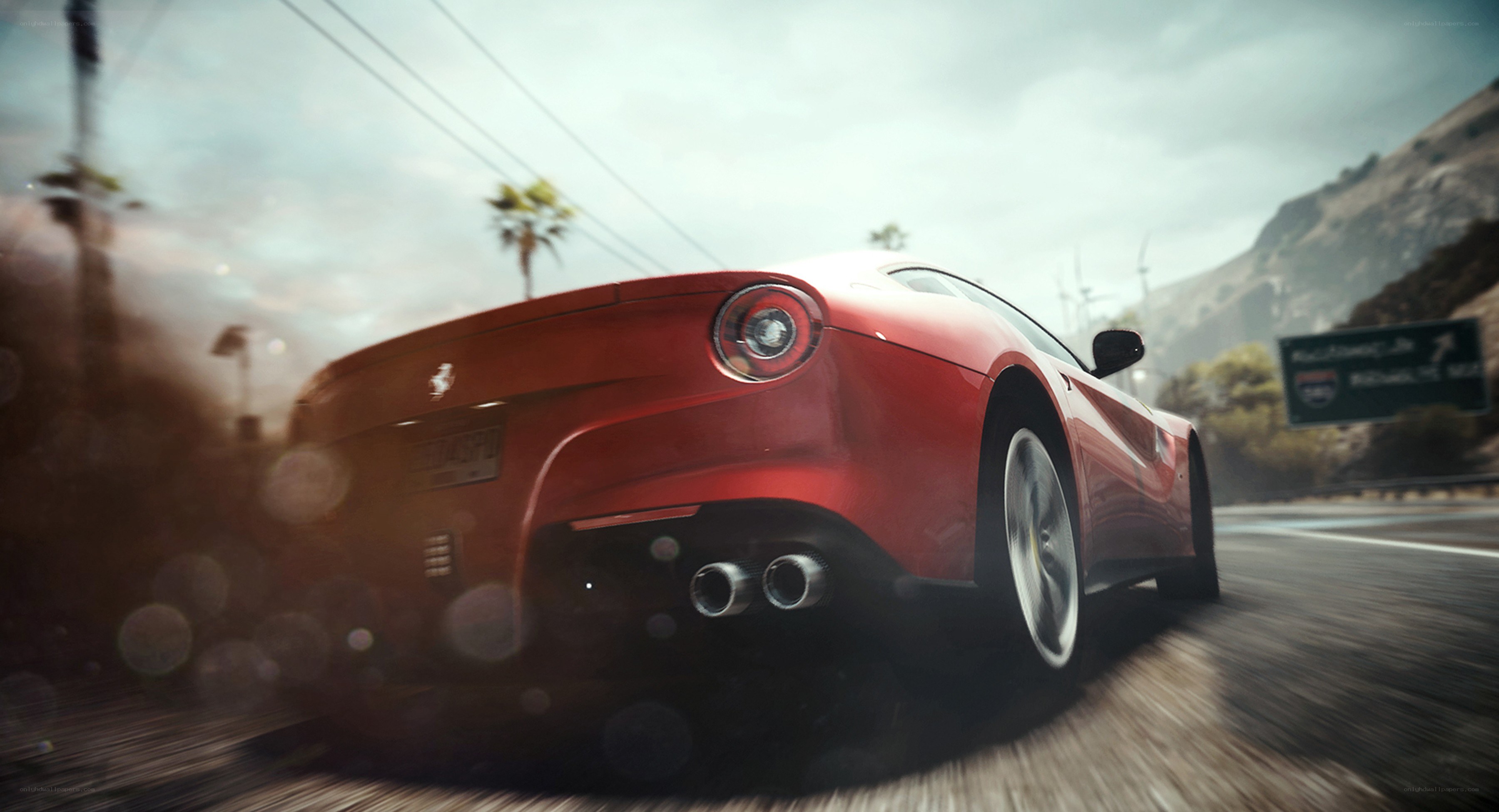 red ferrari speeding on road