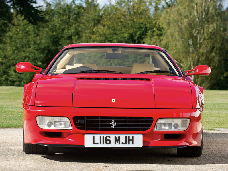 Red Ferrari Sports Car — Calm, Afternoon, Photograph, Grass, Trees