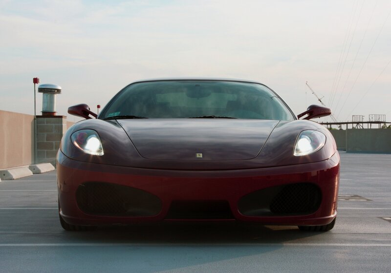 Red Ferrari Sports Car — Calm, Sunset